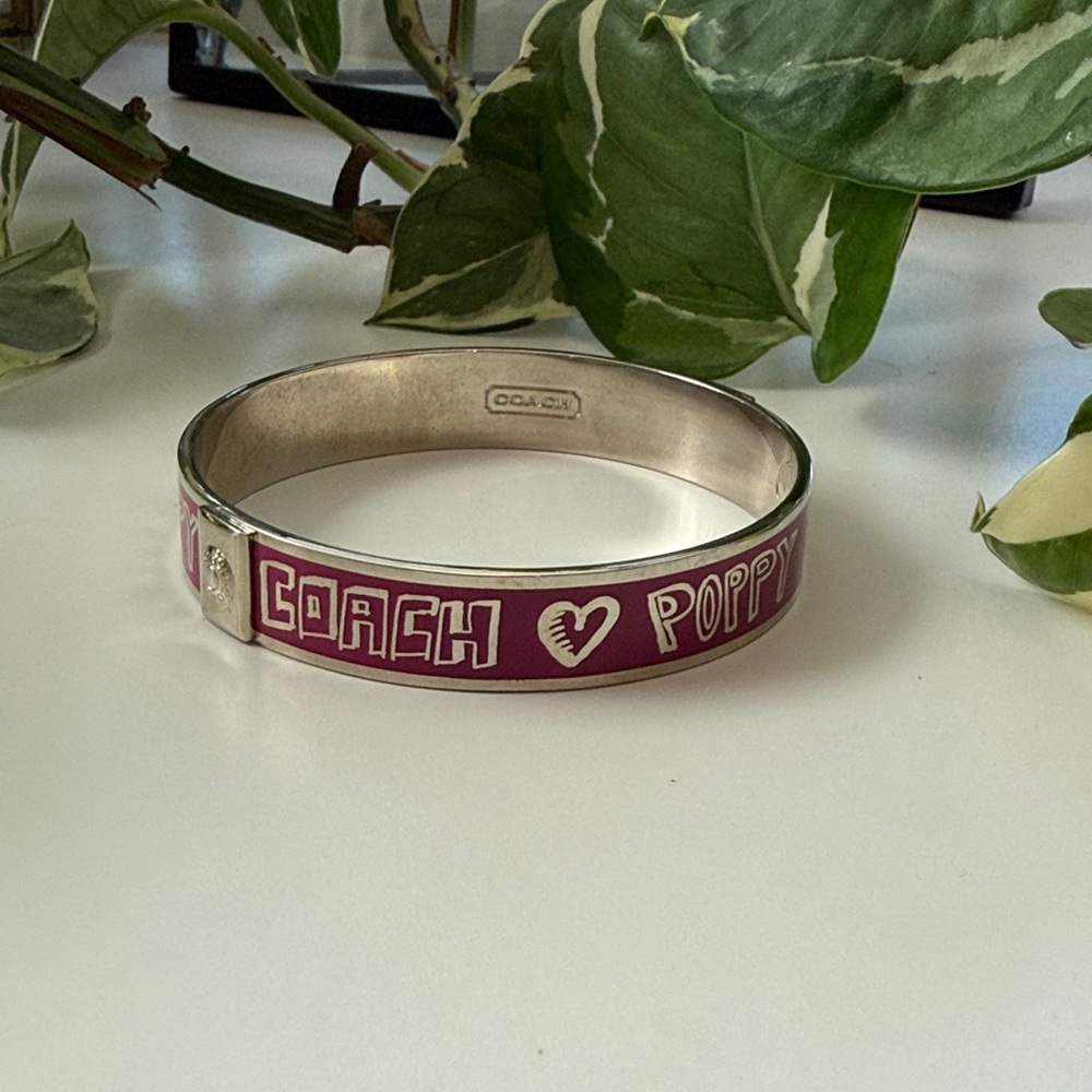 Coach Poppy pink silver logo statement bangle bracelet